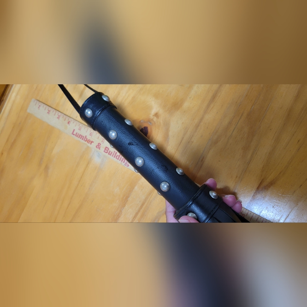 Leather studded whip
